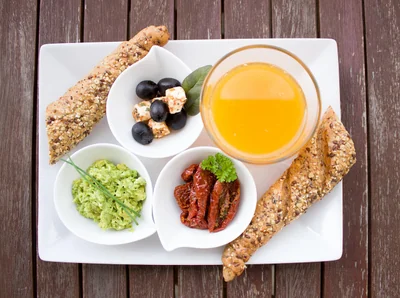 Aménager un petit balcon avec des palettes de récupération : 12 idées 2026